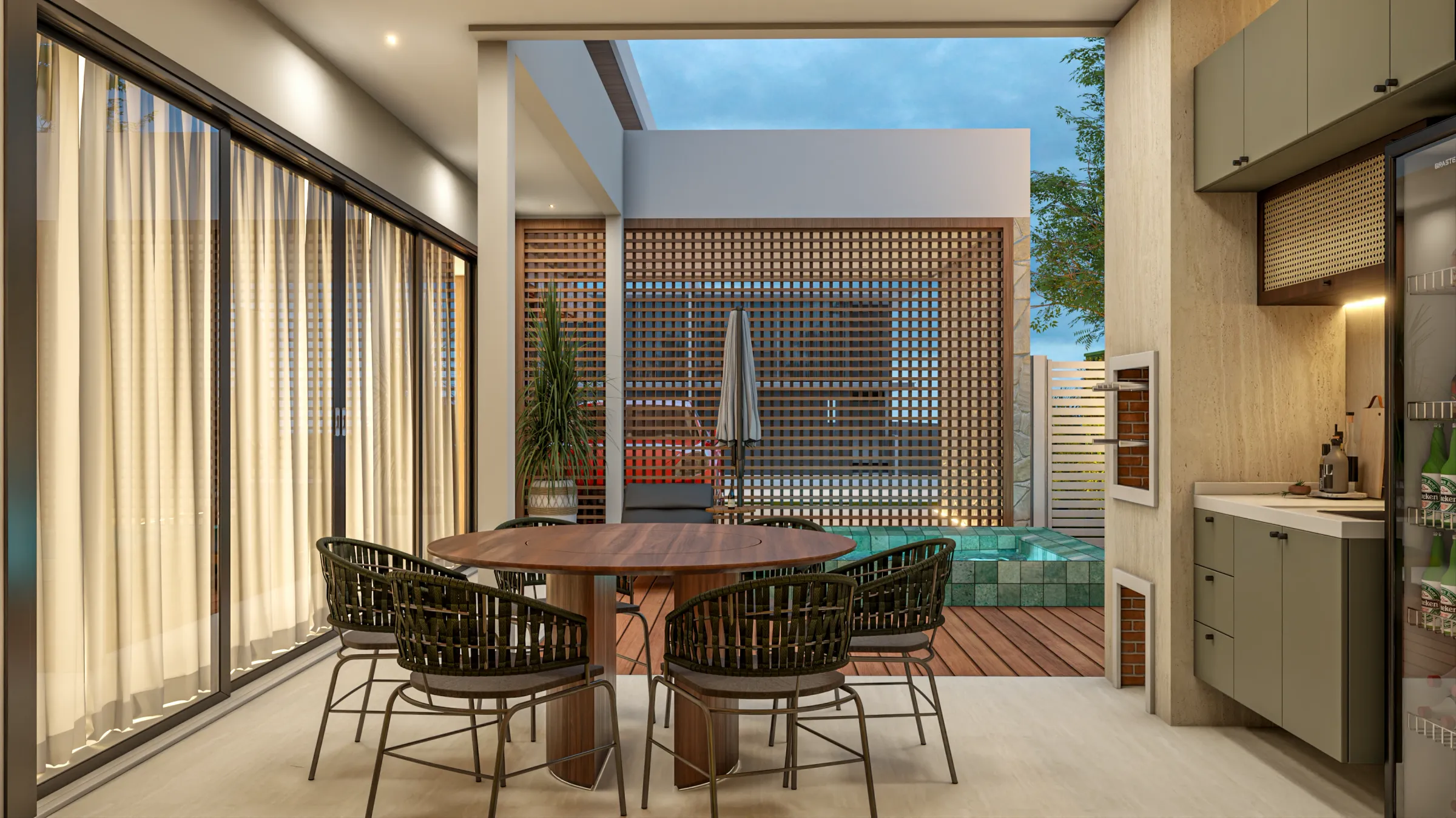 Espaço gourmet do Residencial JO com mesa redonda de madeira e cadeiras de corda, marcenaria verde com frigobar e bancada, integrado à área externa com spa e painel de ripas de madeira