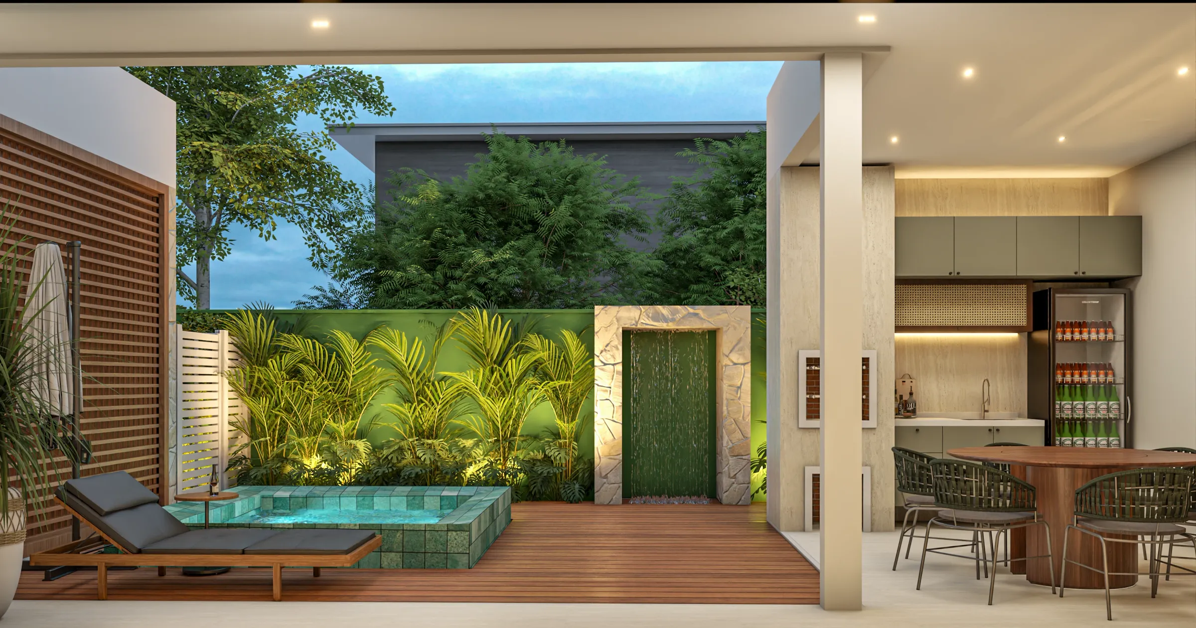 Área externa de lazer do Residencial JO com spa de pastilha verde, espreguiçadeiras, parede com cascata de água emoldurada em pedra, jardim tropical e espaço gourmet com frigobar de bebidas